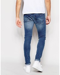 blaue Jeans mit Destroyed-Effekten von WÅVEN