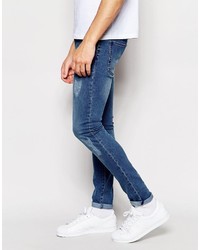 blaue Jeans mit Destroyed-Effekten von WÅVEN