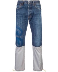 blaue Jeans mit Flicken von Geo