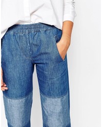 blaue Jeans mit Flicken von Gat Rimon