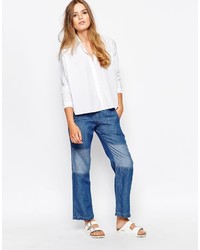 blaue Jeans mit Flicken von Gat Rimon