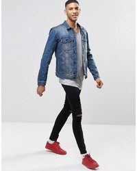 blaue Jeansjacke von Religion