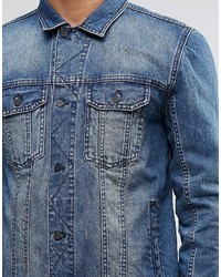 blaue Jeansjacke von Religion