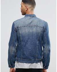 blaue Jeansjacke von Religion