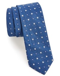 blaue Krawatte mit Blumenmuster
