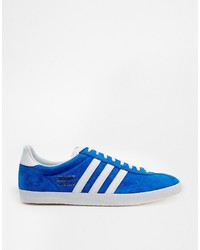 blaue Leder Turnschuhe von adidas