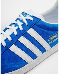 blaue Leder Turnschuhe von adidas