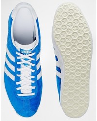 blaue Leder Turnschuhe von adidas