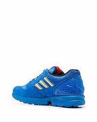 blaue Sportschuhe von adidas