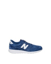 blaue Sportschuhe von New Balance