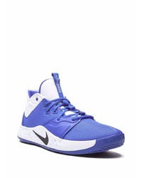 blaue Sportschuhe von Nike