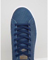 blaue Turnschuhe von adidas