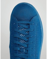 blaue Turnschuhe von adidas