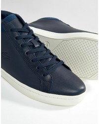 blaue Turnschuhe von Lacoste