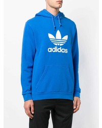 blauer bedruckter Pullover mit einem Kapuze von adidas