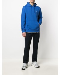 blauer Fleece-Pullover mit einem Kapuze von Tommy Jeans