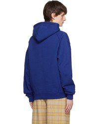 blauer Pullover mit einem Kapuze von Axel Arigato