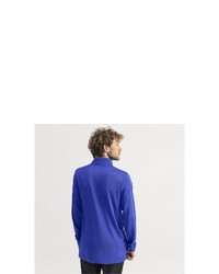 blauer Pullover mit einem Reißverschluss am Kragen von Puma