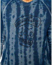 blauer Pullover mit einem Rundhalsausschnitt mit Acid-Waschung