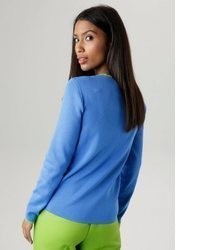 blauer Pullover mit einem Rundhalsausschnitt von Aniston SELECTED