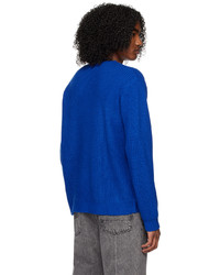 blauer Pullover mit einem Rundhalsausschnitt von PLACES+FACES