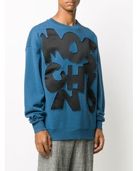 blaues bedrucktes Sweatshirt von Moschino