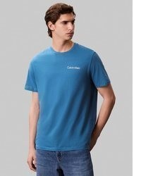 blaues bedrucktes T-Shirt mit einem Rundhalsausschnitt von Calvin Klein Jeans