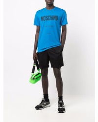 blaues bedrucktes T-Shirt mit einem Rundhalsausschnitt von Moschino