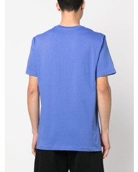 blaues bedrucktes T-Shirt mit einem Rundhalsausschnitt von Moschino