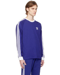 blaues horizontal gestreiftes Langarmshirt von adidas Originals