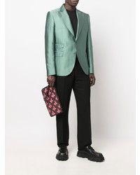 braune bedruckte Leder Clutch Handtasche von Moschino