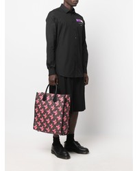 braune bedruckte Shopper Tasche aus Leder von Moschino