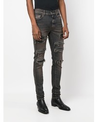 braune enge Jeans mit Destroyed-Effekten von Amiri