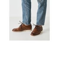 braune Leder Oxford Schuhe von tamaris