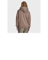 brauner Pullover mit einem Kapuze von adidas Originals