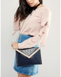 dunkelblaue beschlagene Clutch von Carvela