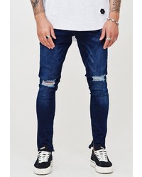 dunkelblaue enge Jeans mit Destroyed-Effekten von behype