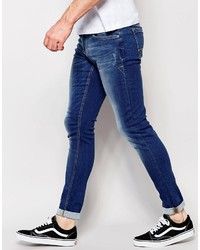 dunkelblaue enge Jeans mit Destroyed-Effekten von Blend of America