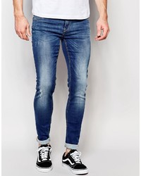 dunkelblaue enge Jeans mit Destroyed-Effekten von Blend of America