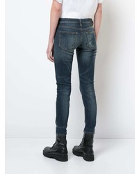 dunkelblaue enge Jeans mit Destroyed-Effekten von R13