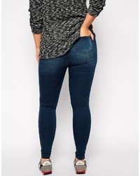 dunkelblaue enge Jeans mit Destroyed-Effekten von Asos