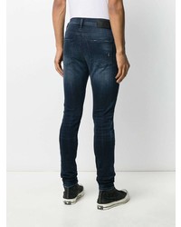 dunkelblaue enge Jeans mit Destroyed-Effekten von Diesel