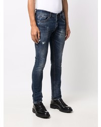 dunkelblaue enge Jeans mit Destroyed-Effekten von Dondup