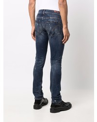 dunkelblaue enge Jeans mit Destroyed-Effekten von Dondup