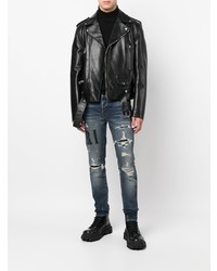 dunkelblaue enge Jeans mit Destroyed-Effekten von Amiri