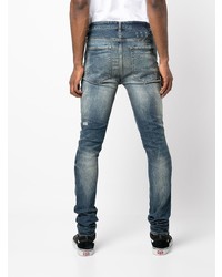 dunkelblaue enge Jeans mit Destroyed-Effekten von Ksubi