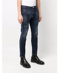 dunkelblaue enge Jeans mit Destroyed-Effekten von Philipp Plein