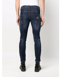 dunkelblaue enge Jeans mit Destroyed-Effekten von Philipp Plein