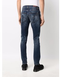 dunkelblaue enge Jeans mit Destroyed-Effekten von Dondup