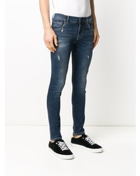 dunkelblaue enge Jeans mit Destroyed-Effekten von Dolce & Gabbana